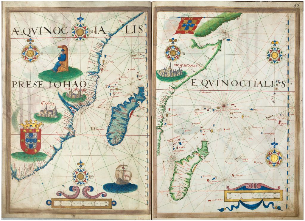 Illuminated Portuguese atlas with added depictions of ships, castles, and a coat-of-arms.