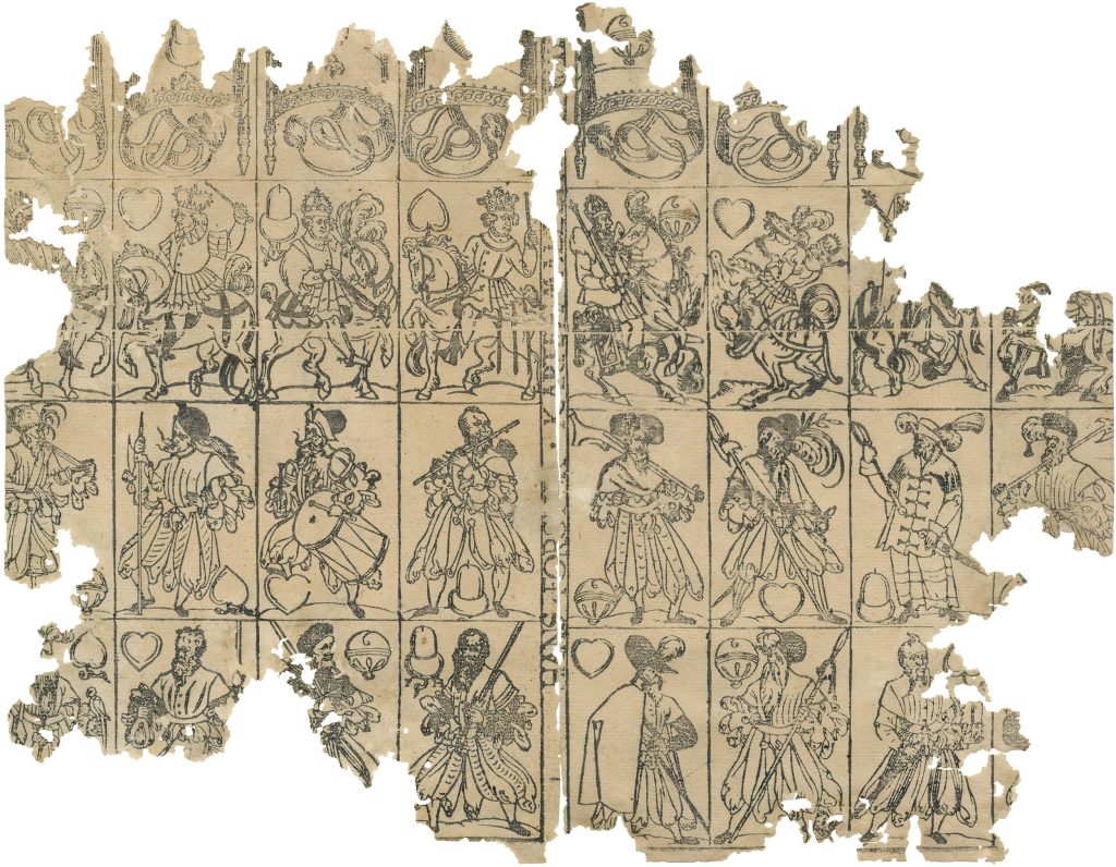 Heavily damaged premodern playing cards, each depicting a man in different attire.