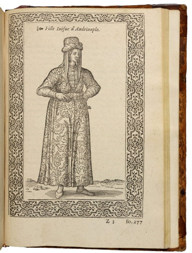 Engraving of a young Jewish woman wearing a head piece and a patterned dress.